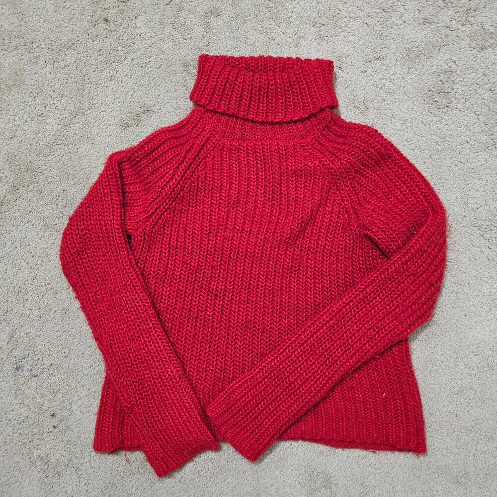 Red cable knit turtleneck sweater